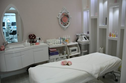 white wooden vanity table with mirror